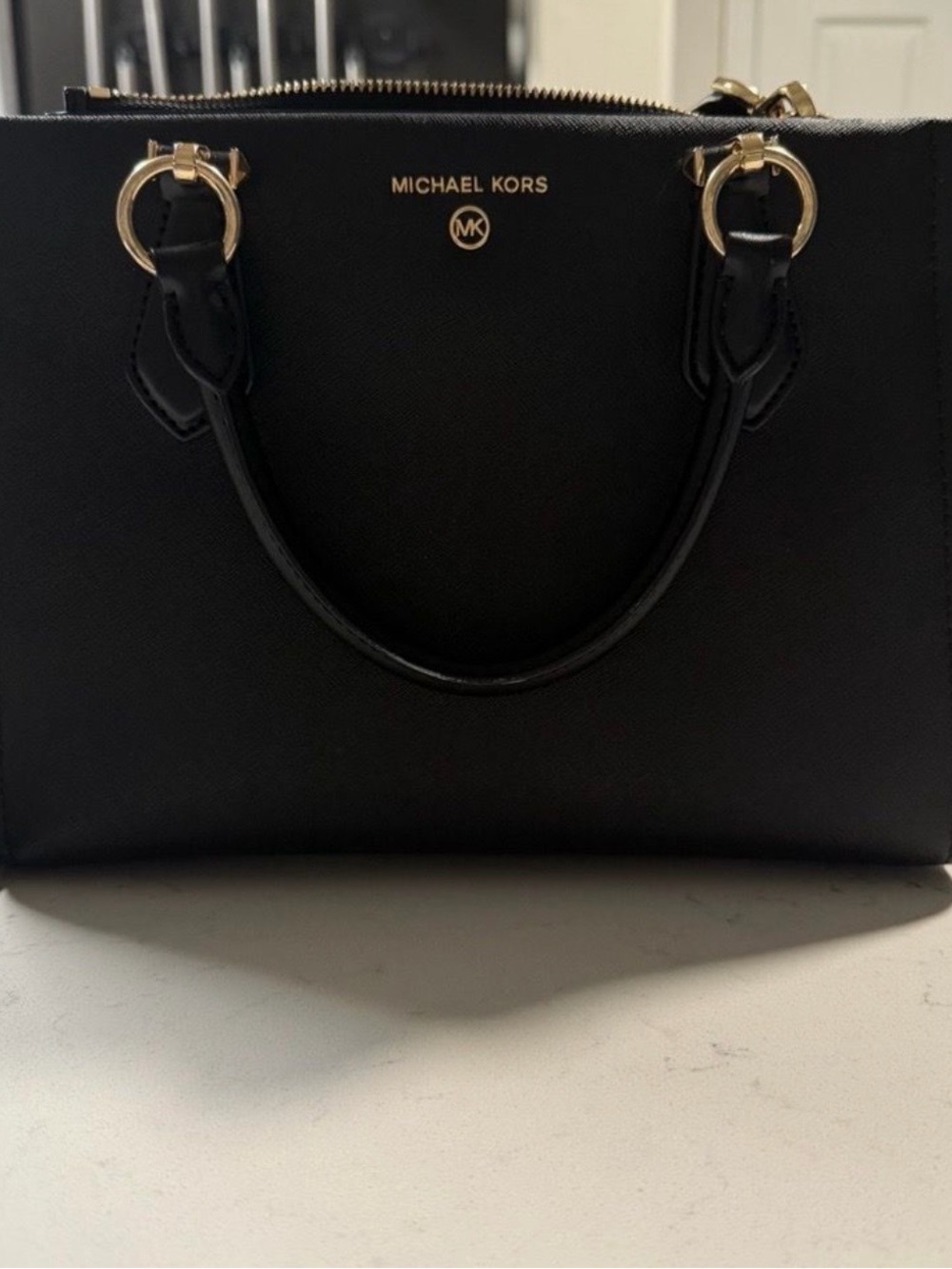 Michael Kors Black Leather Satchel with Gold Accents